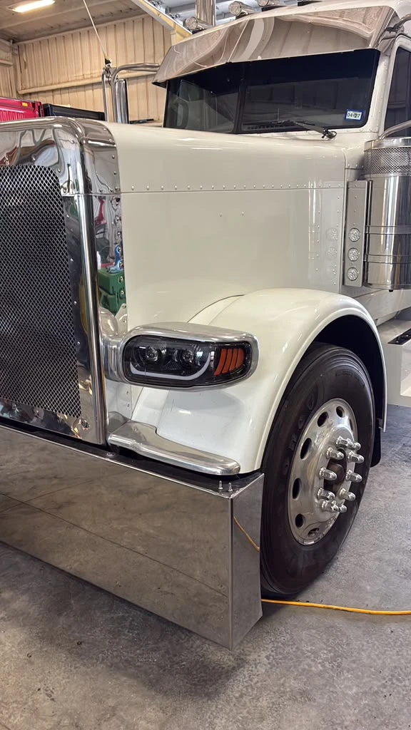 Semi truck fender and wheel after polishing, mirror finish