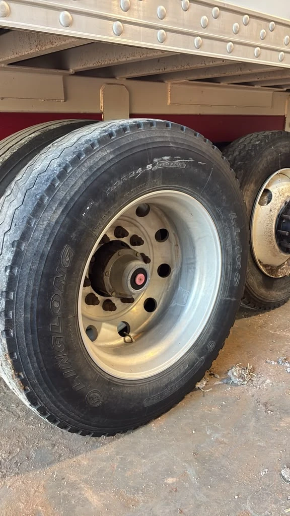 Semi truck aluminum wheel before polishing, dull and oxidized