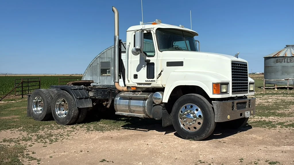 White Mack semi truck day cab
